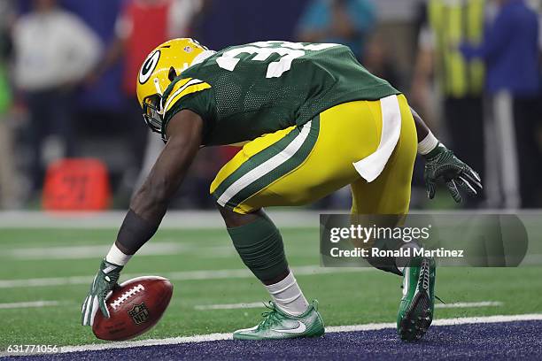 Christine Michael of the Green Bay Packers bobbles a kickoff during the second quarter against the Dallas Cowboys in the NFC Divisional Playoff game...