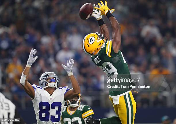Kentrell Brice of the Green Bay Packers defends a pass to Terrance Williams of the Dallas Cowboys during the third quarter in the NFC Divisional...