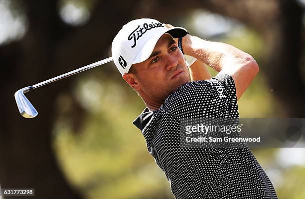 Justin Thomas of the United States plays his shot from the fourth tee during the final round of the Sony Open In Hawaii at Waialae Country Club on...