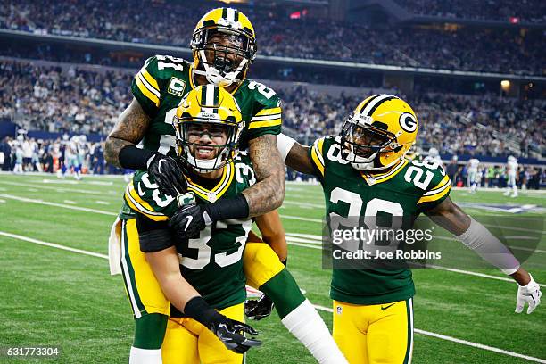 Micah Hyde, Ha Ha Clinton-Dix, and Josh Hawkins of the Green Bay Packers celebrate in the second half during the NFC Divisional Playoff Game against...