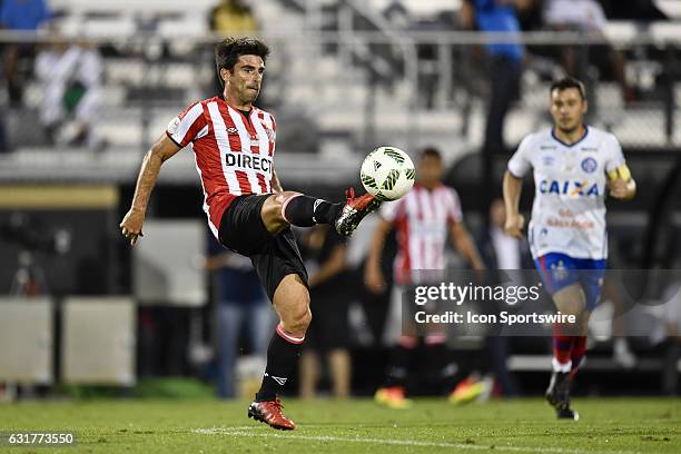 Estudiantes midfielder Rodrigo Brana passes the ball during the second half of the Florida Cup game between Bahia and Estudiantes on January 15 at...