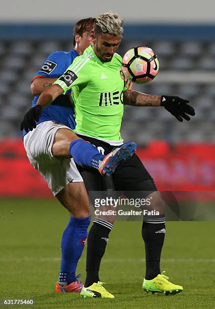 Rio Ave FC's midfielder Ruben Ribeiro with Belenenses's midfielder Vitor Gomes from Portugal in action during the Primeira Liga match between CF Os...