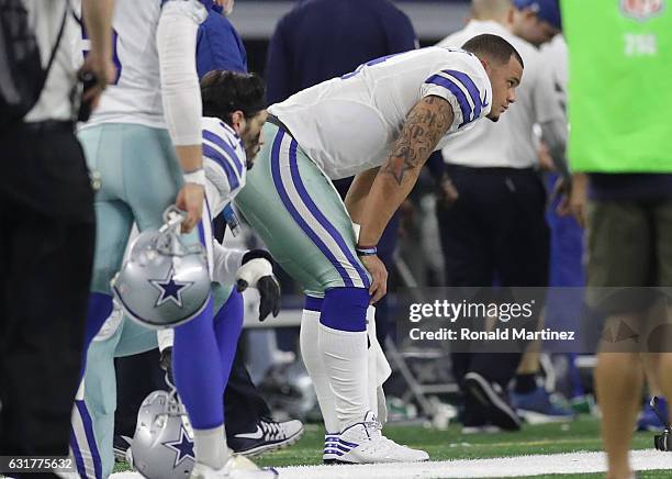 Dak Prescott of the Dallas Cowboys reacts after losing to the Green Bay Packers in the NFC Divisional Playoff game at AT&T Stadium on January 15,...