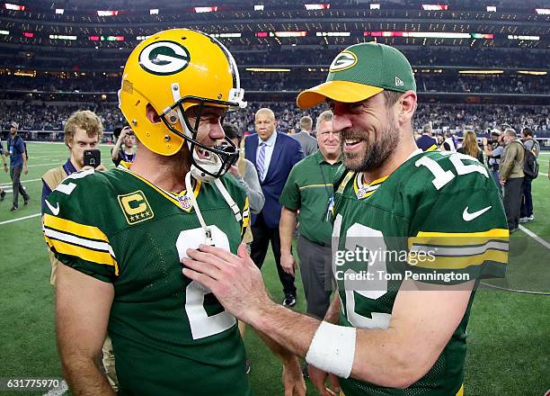 Mason Crosby of the Green Bay Packers celebrates with Aaron Rodgers of the Green Bay Packers after kicking the game winning field goal against the...