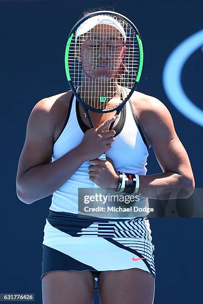 Destanee Aiava of Australia reacts after a point in her first round match against Mona Barthel of Germany on day one of the 2017 Australian Open at...