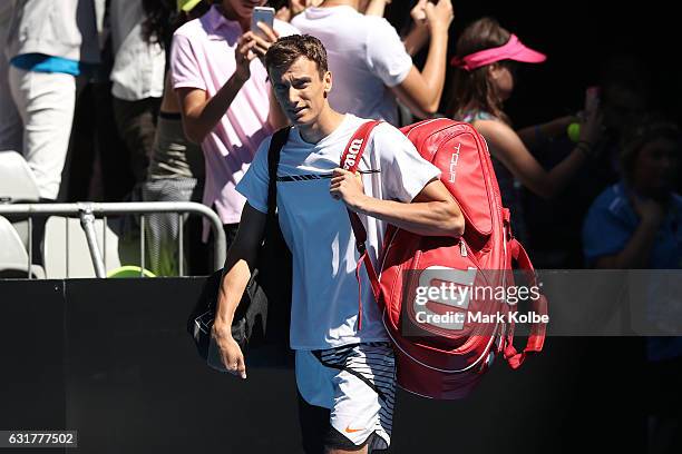 Andrey Kuznetsov of Russia walks onto the court in his first round match against Kei Nishikori of Japan on day one of the 2017 Australian Open at...