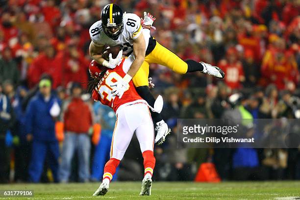 Free safety Ron Parker of the Kansas City Chiefs tackles tight end Jesse James of the Pittsburgh Steelers in after a catch for a first down in the...