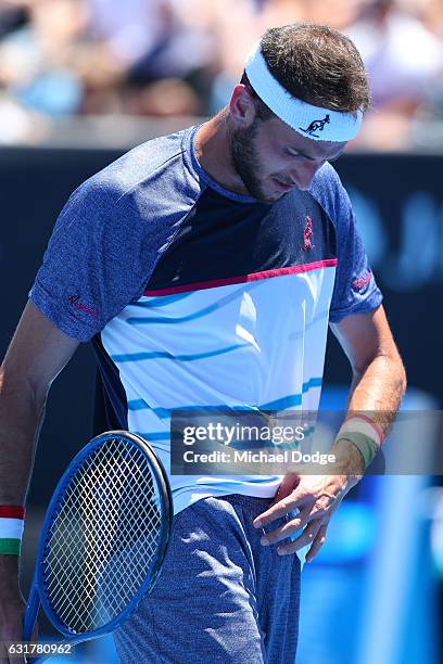 Luca Vanni of Italy reacts to an injury in his first round match against Tomas Berdych of the Czech Republic on day one of the 2017 Australian Open...