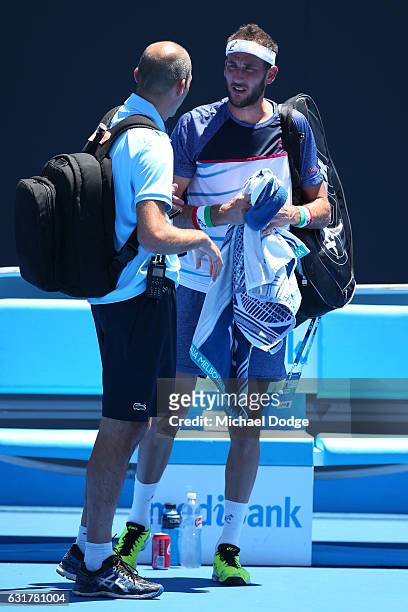 Luca Vanni of Italy seeks medical treatment in his first round match against Tomas Berdych of the Czech Republic on day one of the 2017 Australian...