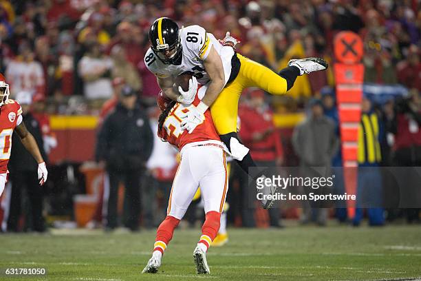 Kansas City Chiefs free safety Ron Parker upends Pittsburgh Steelers tight end Jesse James during the NFL AFC divisional playoff game between the...