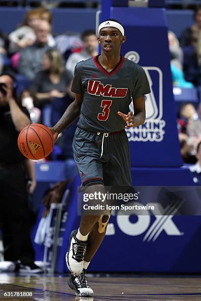 UMass Minutemen guard Dejon Jarreau dribbles the ball up court during the second half of an NCAA basketball game between UMass Minutemen and Rhode...