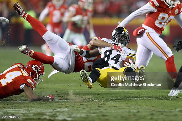 Wide receiver Antonio Brown of the Pittsburgh Steelers is tackled by cornerback Marcus Peters of the Kansas City Chiefs during the second half in the...