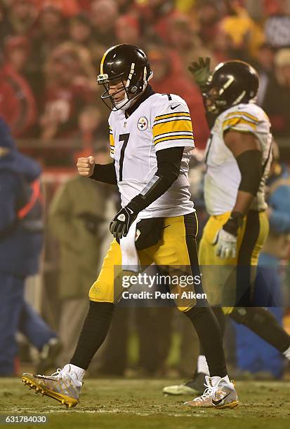 Quarterback Ben Roethlisberger of the Pittsburgh Steelers pumps his fist after throwing a pass for a game sealing first down against the Kansas City...