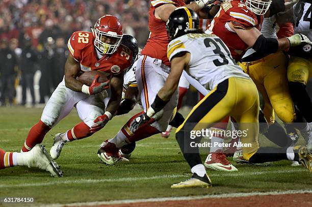 Running back Spencer Ware of the Kansas City Chiefs rushes the ball on a run that would lead turnover an eventual touchdown against the Pittsburgh...