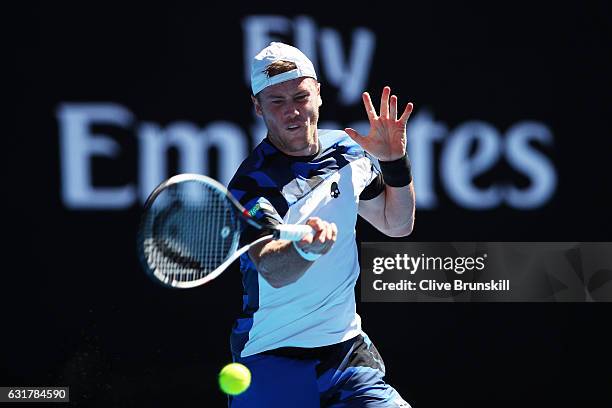 Illya Marchenko of the Ukraine plays a forehand in his first round match against Andy Murray of Great Britain on day one of the 2017 Australian Open...
