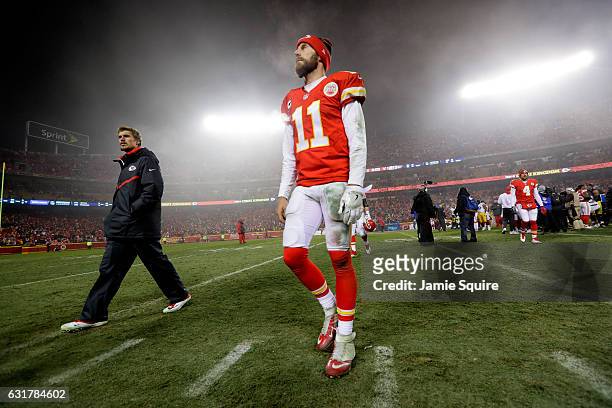 Quarterback Alex Smith of the Kansas City Chiefs walks of the field after being defeated by the Pittsburgh Steelers with a score of 18 to 16 in the...