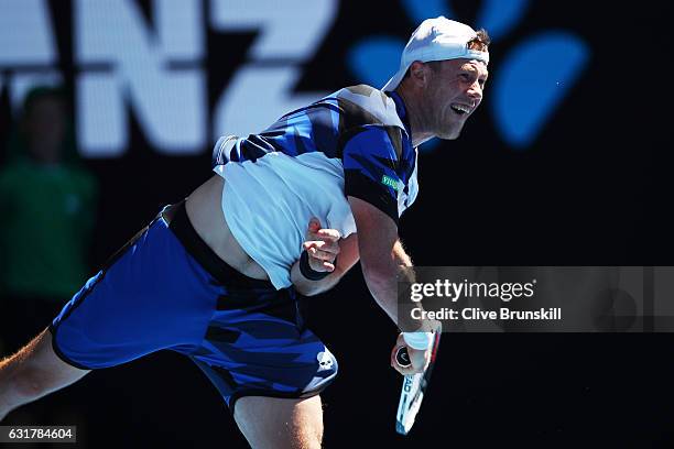 Illya Marchenko of the Ukraine serves in his first round match against Andy Murray of Great Britain on day one of the 2017 Australian Open at...