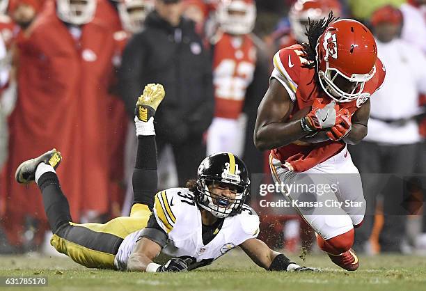 Kansas City Chiefs wide receiver Chris Conley catches a first down pass in front of Pittsburgh Steelers cornerback Ross Cockrell in the fourth...