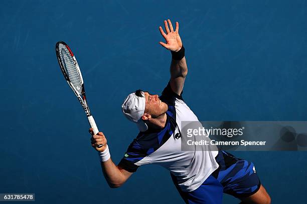 Illya Marchenko of the Ukraine serves in his first round match against Andy Murray of Great Britain on day one of the 2017 Australian Open at...