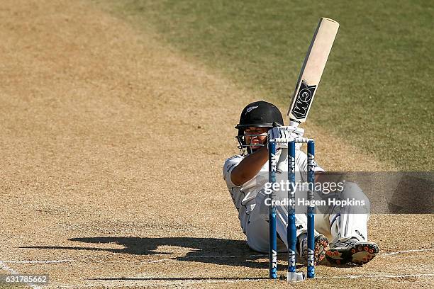 Ross Taylor of New Zealand grimaces after being hit in the groin by a delivery during day five of the First Test match between New Zealand and...