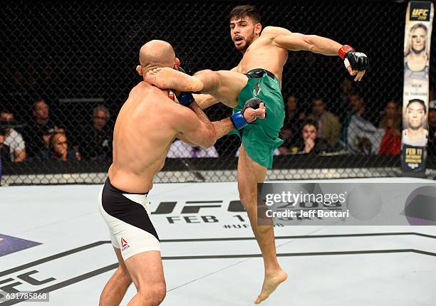 Yair Rodriguez of Mexico kicks BJ Penn in their featherweight bout during the UFC Fight Night event inside Talking Stick Resort Arena on January 15,...