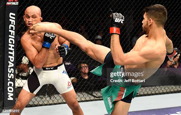 Yair Rodriguez of Mexico kicks BJ Penn in their featherweight bout during the UFC Fight Night event inside Talking Stick Resort Arena on January 15,...