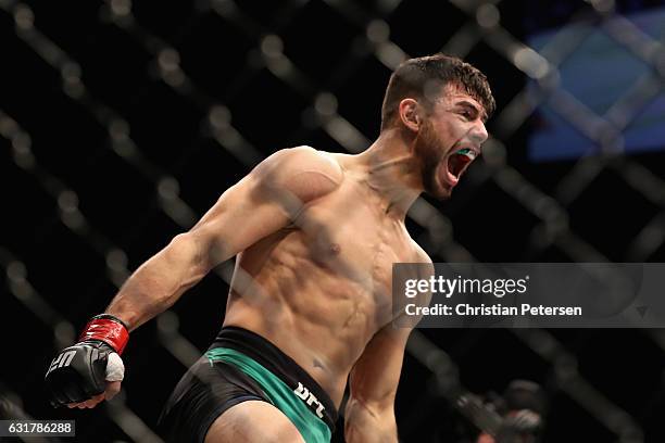 Yair Rodriguez celebrates his victory over BJ Penn during the UFC Fight Night event at the at Talking Stick Resort Arena on January 15, 2017 in...