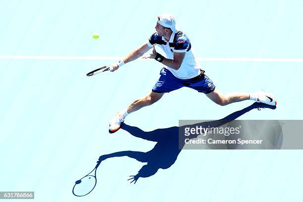 Illya Marchenko of the Ukraine plays a backhand in his first round match against Andy Murray of Great Britain on day one of the 2017 Australian Open...