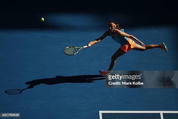 Mariana Duque-Marino of Colombia plays a forehand in her first round match against Svetlana Kuznetsova of Russia on day one of the 2017 Australian...