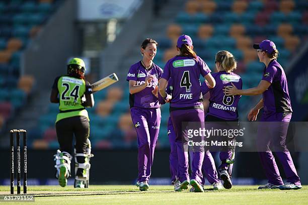 Julie Hunter of the Hurricanes celebrates taking the wicket of Stafanie Taylor of the Thunder during the Women's Big Bash League match between the...