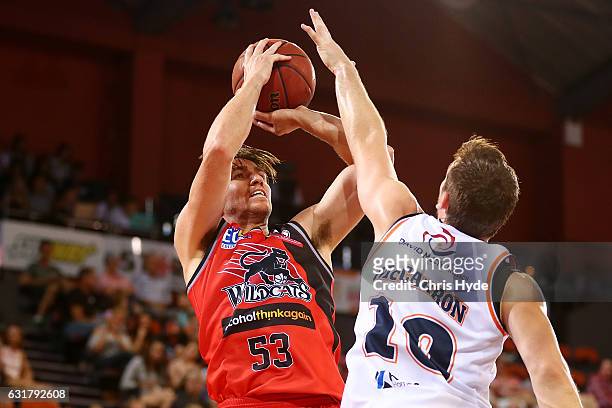 Damian Martin of the Wildcats shoots during the round 15 NBL match between the Cairns Taipans and the Perth Wildcats at Cairns Convention Centre on...