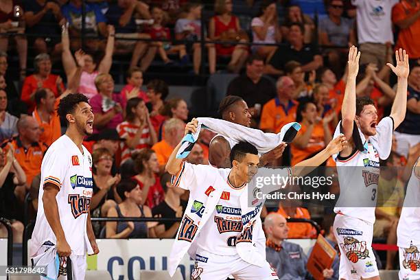 Taipans celebrate a point during the round 15 NBL match between the Cairns Taipans and the Perth Wildcats at Cairns Convention Centre on January 16,...