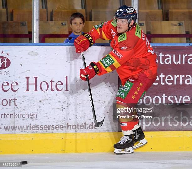 Daniel Kreutzer of the Duesseldorfer EG passes the puck during the action shot on August 14, 2016 in Duesseldorf, Germany.