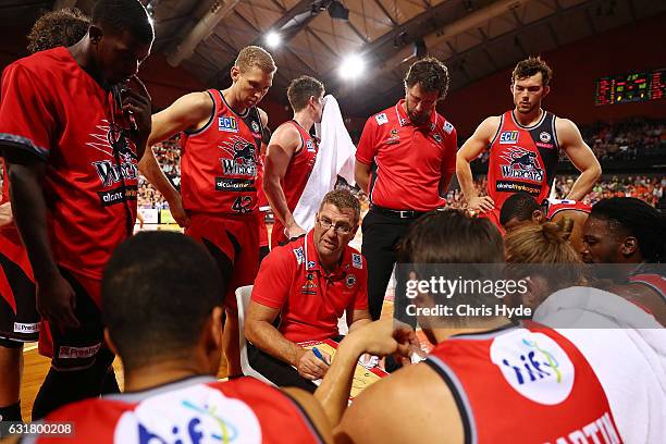 Wildcats coach Trevor Gleeson talks to players during the round 15 NBL match between the Cairns Taipans and the Perth Wildcats at Cairns Convention...