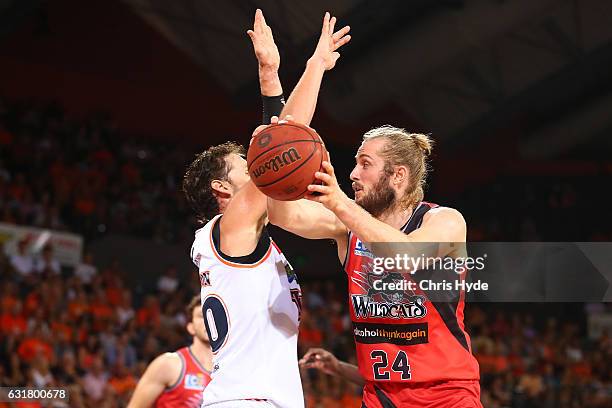 Jesse Wagstaff of the Wildcats passes during the round 15 NBL match between the Cairns Taipans and the Perth Wildcats at Cairns Convention Centre on...