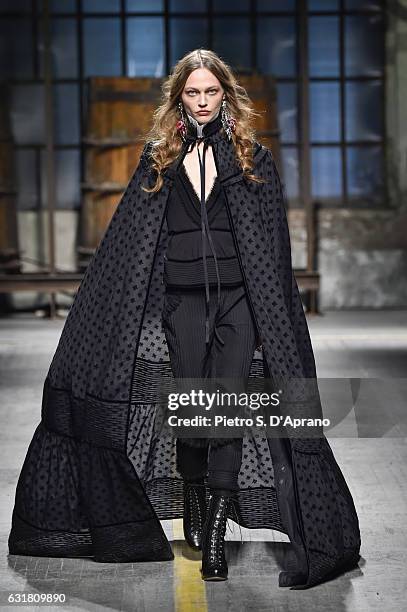 Sasha Pivovarova walks the runway at the Dsquared2 show during Milan Men's Fashion Week Fall/Winter 2017/18 on January 15, 2017 in Milan, Italy.