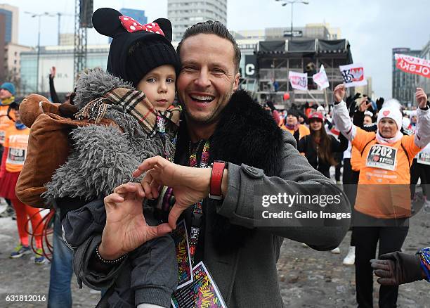 Man with a child participate in the diabetes and first aid charity run on January 15, 2017 in Warsaw, Poland. The run is organised as a part of the...