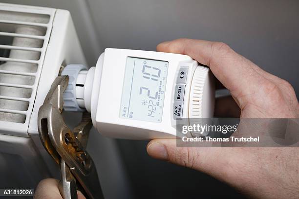 Programmable heater control is installed on a radiator on January 16, 2017 in Berlin, Germany.