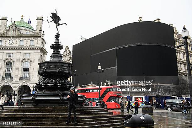The iconic Piccadilly Circus advertising boards remain switched off as work begins on their replacement on January 16, 2017 in London, England. The...