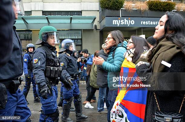 People protest against Chinese policies over Tibet in Bern on Jan. 15 as Chinese President Xi Jinping started a state visit to Switzerland.