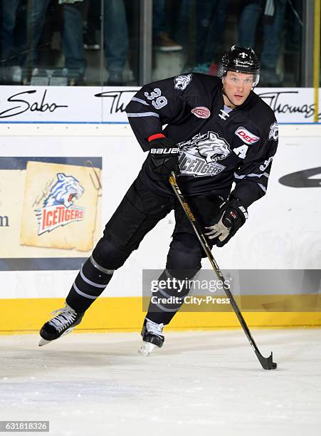 David Steckel of the Thomas Sabo Ice Tigers Nuernberg handles the puck during the action shot on october 3, 2016 in Nuernberg, Germany.