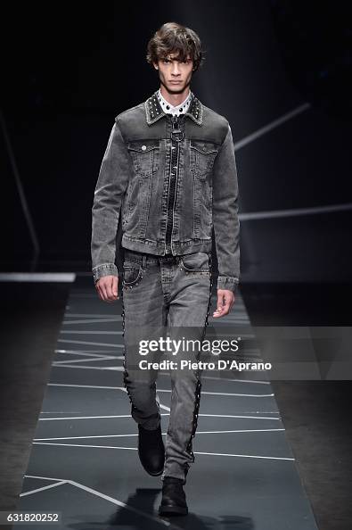 A model walks the runway at the Frankie Morello show during Milan ...