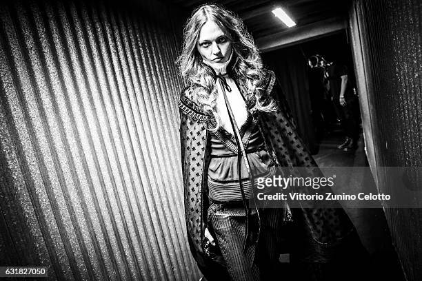 Sasha Pivovarova is seen backstage ahead of the Dsquared2 show during Milan Men's Fashion Week Fall/Winter 2017/18 on January 15, 2017 in Milan,...