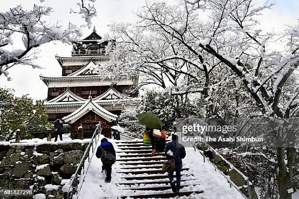 Hiroshima Castle is covered with snow as snow falls wider area on January 15, 2017 in Hiroshima, Japan. The Meteorological Agency is warning many...