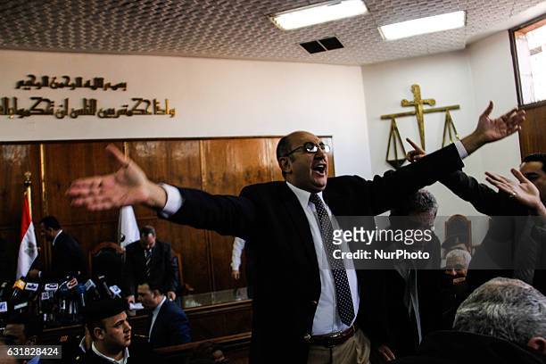 Egyptian lawyer and leftist opposition figure Khaled Ali celebrates in courthouse in Cairo after the verdict. Supreme Administrative Court said two...