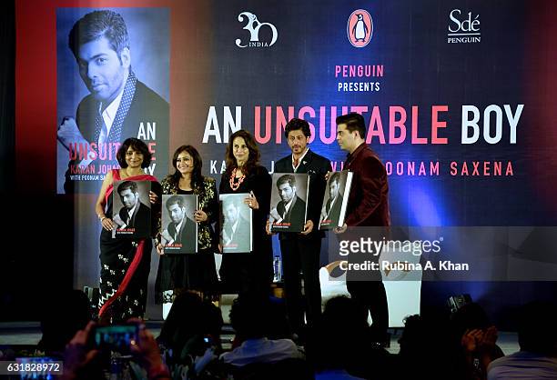 Poonam Saxena, Milee Ashwarya and Shobhaa De, with Shah Rukh Shah as he launches Karan Johar's book 'An Unsuitable Boy' written by the filmmaker and...