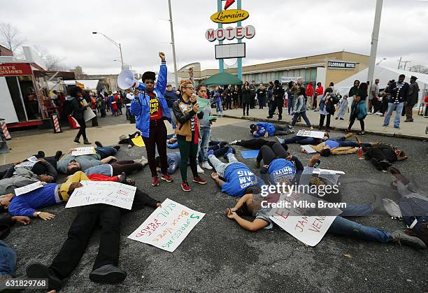 Supporters of the Black Lives Matter movement stage a "die in" outside the National Civil Rights Museum following the annual Martin Luther King Day...