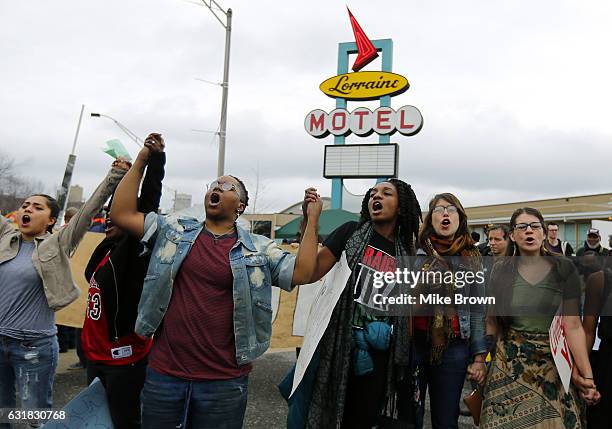 Supporters of the Black Lives Matter movement chant together following the annual Martin Luther King Day march on January 16, 2017 in Memphis,...