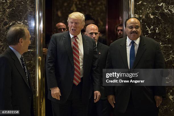 President-elect Donald Trump and Martin Luther King III stand after shaking hands after their meeting at Trump Tower, January 16, 2017 in New York...