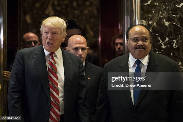President-elect Donald Trump and Martin Luther King III stand after shaking hands after their meeting at Trump Tower, January 16, 2017 in New York...